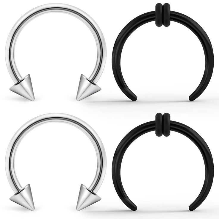 three pairs of black and silver captive rings with metal spikes on each side, one has an