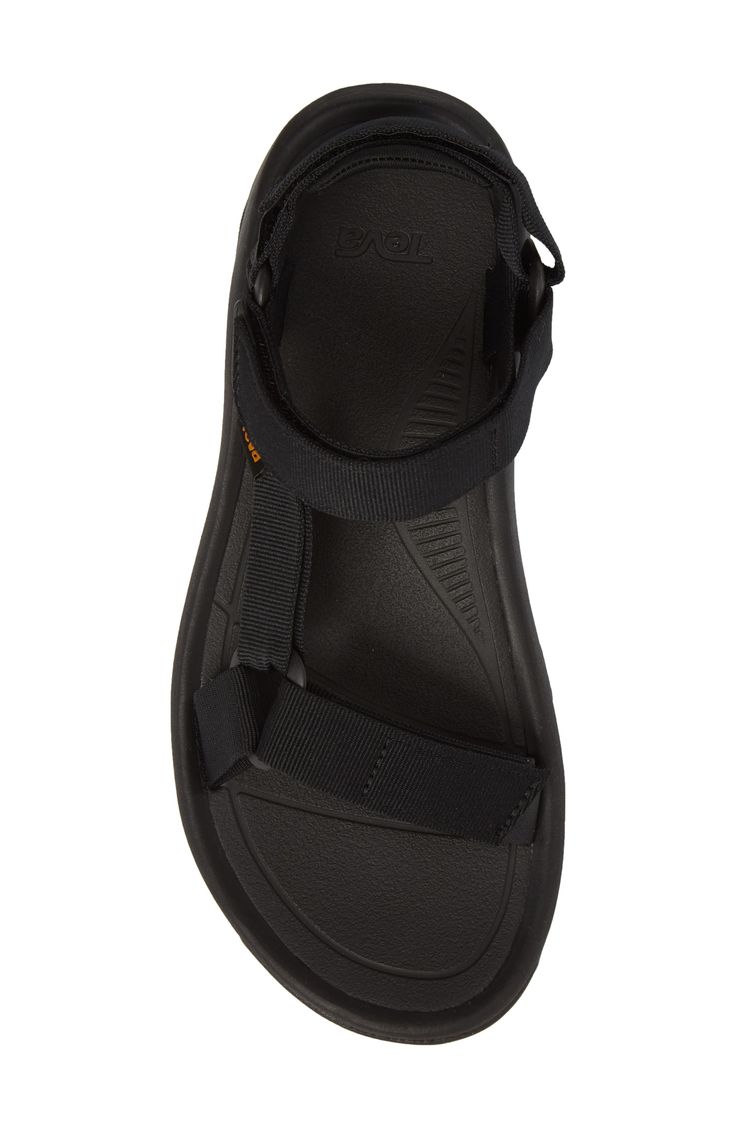 Adjustable hook-and-loop straps mean a custom fit in a water-ready sandal featuring a shock pad and padded heel for additional cushioning. Adjustable straps with hook-and-loop closure Cushioned footbed Textile upper/ textile and synthetic lining and sole Imported Men's Shoes Black Sporty Sandals With Adjustable Strap, Black Double Strap Synthetic Sport Sandals, Black Synthetic Double Strap Sport Sandals, Black Double Strap Sport Sandals With Removable Insole, Black Synthetic Sport Sandals With Adjustable Strap, Synthetic Double Strap Sport Sandals With Adjustable Straps, Synthetic Sport Sandals With Round Toe And Strap, Black Sport Sandals With Adjustable Double Straps, Black Sport Sandals With Adjustable Straps And Round Toe