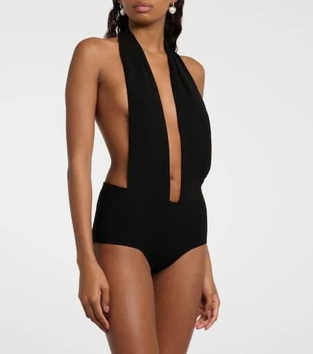 Material: 100% polyester.Care instructions: dry clean.Made in Lebanon.Designer color name: Black.Closure: hook-fastening back Elegant Polyamide Bodysuit For Spring, High Waist Elastane Bodysuit For Summer, Backless Elastane Bodysuit For Party, Summer High-waist Elastane Bodysuit, Backless Elastane Bodysuit For Spring, Chic High Stretch Backless Bodysuit, Spring Backless Elastane Bodysuit, Chic Sleeveless Bodysuit, Summer High Stretch Polyamide Bodysuit