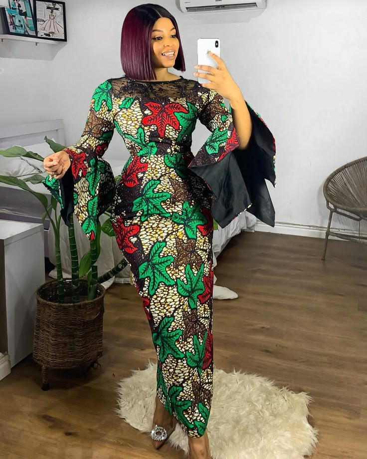 Simple Ankara styles by the queen esth Ankara Floral Dress Styles, Simple Ankara Straight Dress Styles, Long Straight Gown Styles, Simple Ankara Gown Style For Ladies, 2024 Ankara Styles For Ladies, Ankara Long Gown Styles For Ladies 2024, Ankara Straight Gowns Long, Classy Ankara Styles For Ladies, Straight Gown Ankara Styles