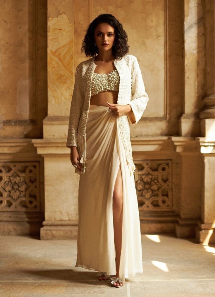 Ivory Pearl Macrame Jacket and Pant Set Duara - Fabilicious Fashion Draping Techniques Skirt, Drape Skirt With Jacket, Futuristic Indian Fashion, Elegant Lehenga With Pearl Embroidery And Traditional Drape, Elegant Lehenga With Pearl Embroidery In Traditional Drape, Elegant Fitted Lehenga With Pearl Embroidery, Elegant Floor-length Lehenga With Pearl Embroidery, Beige Embellished Party Sets, Hand Embellished Floor-length Sets For Ceremony