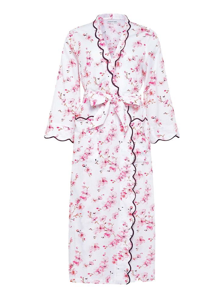 The perfect robe for spring. My cherry blossom print was drawn to capture the beauty and optimism of each flower as they bloom in the spring. Donning this robe in the morning or evening will give you joy and a feeling of hope for the warmer days to come. Fully hand scalloped in a sophisticated chocolate trim, made with lightweight cotton to anticipate the warming weather it will be your new favorite robe. On colder days layer my cherry blossom pj's to match and keep extra warm! Product Details 1 Spring Sleep Robe With Kimono Sleeves, Pink Floral Print Sleepwear For Spring, Spring Pink Floral Print Sleepwear, Spring Floral Print Pink Sleepwear, Floral Print Long Sleeve Sleep Kimono, Spring Feminine Robe With Kimono Sleeves, White Floral Print Sleepwear For Spring, Pink Spring Kimono For Brunch, White Spring Kimono For Loungewear