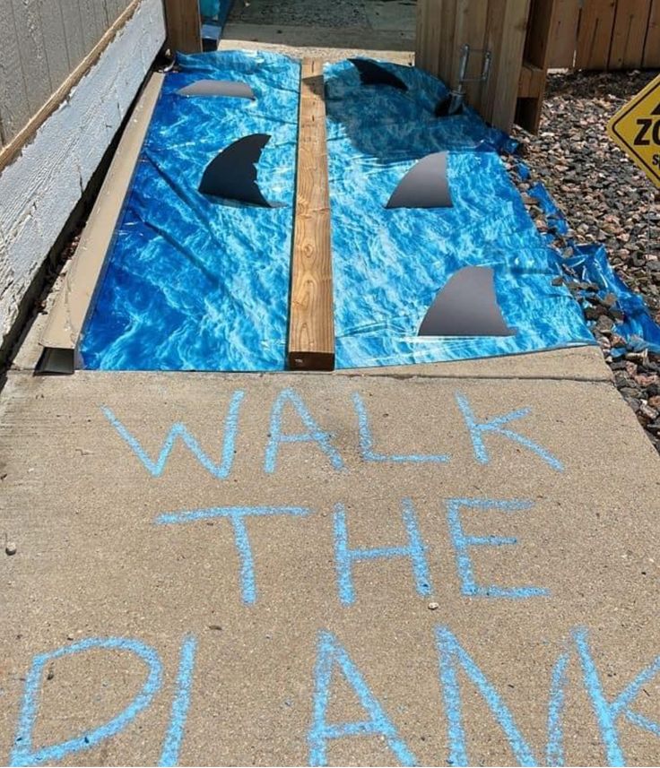 the sidewalk has been painted with blue chalk