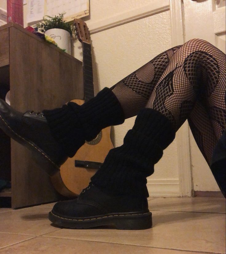 Docs And Leg Warmers Outfit, Fishnets And Leg Warmers, Dr Martens With Leg Warmers, Black Leg Warmers Aesthetic, Snake Tights Outfit, Dr Martens Leg Warmers, Leg Warmers Over Boots, Doc Martens Leg Warmers, Leg Warmers With Doc Martens