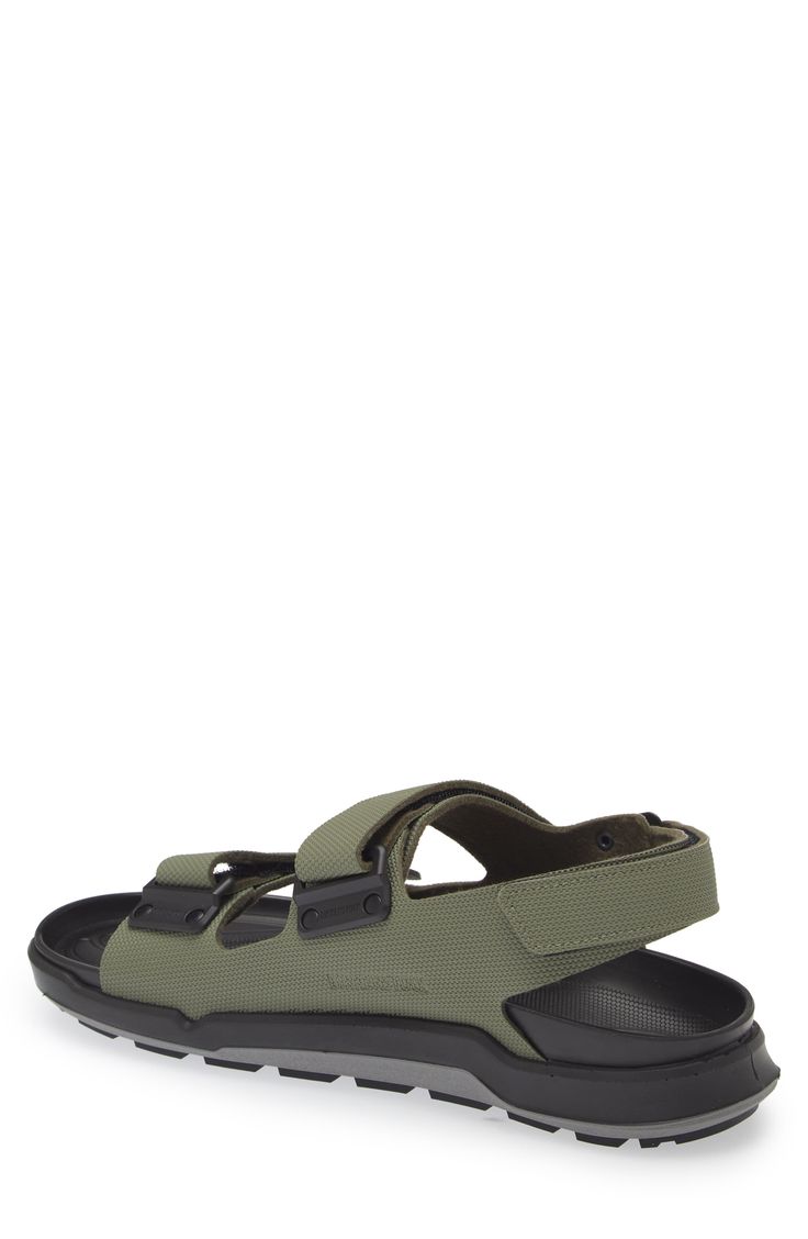 Gear up for adventure in the breezy comfort of this slingback sandal bolstered by a cushy, arch-supporting footbed and a trio of adjustable straps. Contoured footbed with arch support Synthetic upper/synthetic and textile lining/synthetic sole Made in Germany Casual Round Toe Slingback Sandals For Outdoor, Synthetic Open Toe Slingback Sandals For Outdoor, Casual Slingback Sandals For Outdoor, Green Casual Sport Sandals With Adjustable Strap, Casual Green Sport Sandals With Adjustable Strap, Green Casual Sandals With Adjustable Straps, Green Sandals With Removable Insole For Outdoor, Adjustable Green Sport Sandals With Removable Insole, Comfortable Outdoor Sport Slide Sandals