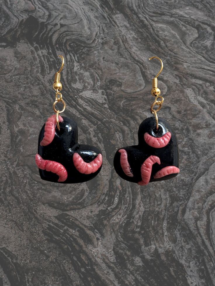 black and pink heart shaped earrings with gold hooks