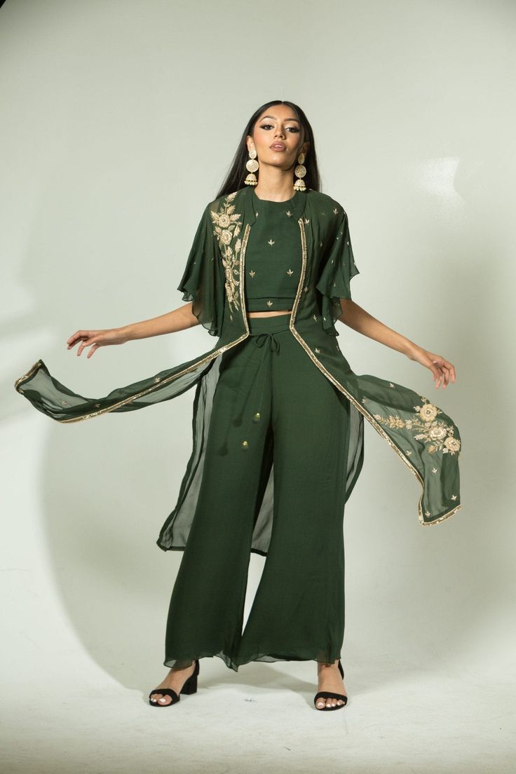 This gorgeous olive green pant set features an embroidered front open jacket, perfect for party wear or as a stylish contemporary outfit. Crafted from quality materials for a timeless look, this set will be a timeless addition to your wardrobe. Green Pant Set With Resham Embroidery For Wedding, Green Resham Embroidered Pant Set For Wedding, Green Resham Embroidery Pant Set For Wedding, Festive Green Sets With Gold Embroidery, Elegant Green Designer Pant Set, Green Sets With Gold Embroidery For Eid, Designer Green Pant Set With Zari Work, Festive Green Pant Set With Floral Embroidery, Elegant Green Embroidered Pant Set