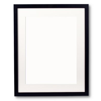 a black and white frame hanging on the wall with an empty space in front of it