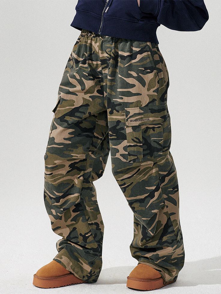 Editor's Notes The military cargo pants have a wide fit and two layer dart at the knees for a stylish silhouette. Use the drawstring at the waist and bottom hem to adjust size. - Big pockets on the sides- Baggy, loose fit- Casual cargo pants to pair with various topsMeasurements(in.)ONE SIZE- Total Length: 40.94 in.- Waist: 12.6 in.- Hips: 22.44 in.- Front Rise: 12.2 in.- Thigh: 13.78 in.*The exact size may vary by ±0.39-0.79 depending on the method of measurementModel info: Anna Lenet Military Cargo Pants, Casual Cargo Pants, Big Pockets, The Military, Mens Outerwear, Men Shoes Size, Dart, Mens Bottom, Cargo Pants