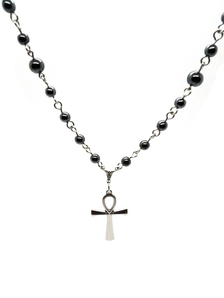 Made to Order! An enduring staple of the goth subculture, this ankh necklace is a goth jewelry cornerstone for your wardrobe. The chain construction is kept simple to allow the pendant to shine. This ankh is made of stainless steel and will not tarnish over time. The sturdy construction and simple beauty of this necklace make a reliable piece that you won't want to leave home without. The shiny steel will contrast perfectly with all manner of gothic attire. At your favorite club, you can dance a Emo Necklace, Gothic Attire, Ankh Necklace, Goth Subculture, Goth Accessories, Goth Necklace, Diy Clothes Design, Goth Jewelry, Necklace Chain Lengths