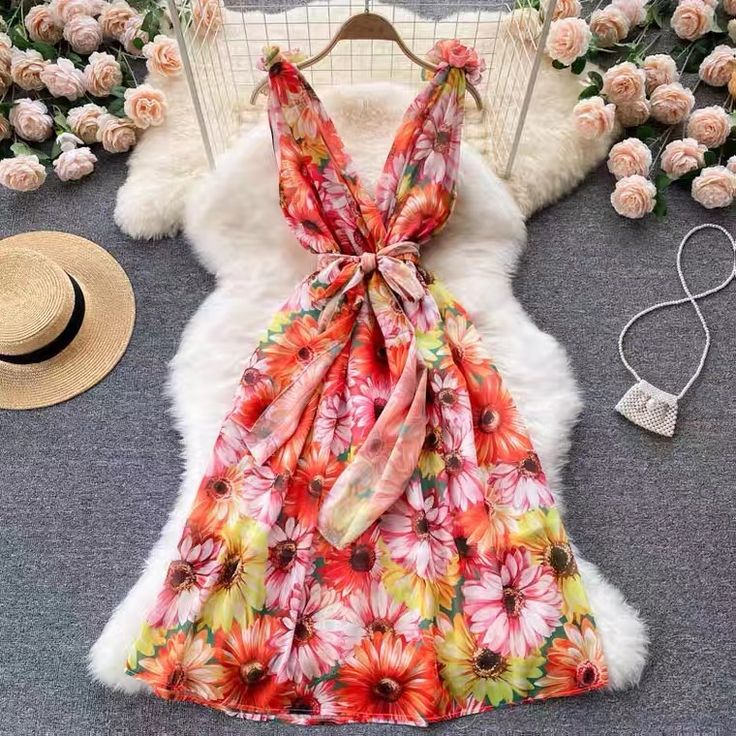 Printed flower dress, V-neck, waist, halter, sexy dress, new style, pastoral print dressMaterial:blendedColor:as pictureStyle:country styleFeatures:printed flowerSize(CM):S,M,L,XL,2XL 1inch=2.54cmS length 110 bust 84 waist 70&ltp&gtM length 111 bust 88 waist 74</p>&ltbr/>&ltp&gtL length 112 bust 92 waist 78</p>&ltbr/>&ltp&gtXL length 113 chest 96 waist 82</p>&ltbr/>&ltp&gtXXL length 114 bust 100 waist 86</p>&ltbr/&g V-neck Printed Floral Dress For Garden Party, Printed V-neck Spring Vacation Dress, Multicolor Floral Print V-neck Dress For The Beach, Spring Floral Print V-neck Sundress, Summer Floral Print V-neck Dress For Party, Spring Floral Print V-neck Dress For Vacation, Multicolor V-neck Dress For Summer Vacation, Fitted Floral Print V-neck Dress For Spring, Floral Print Knee-length Sundress For Brunch