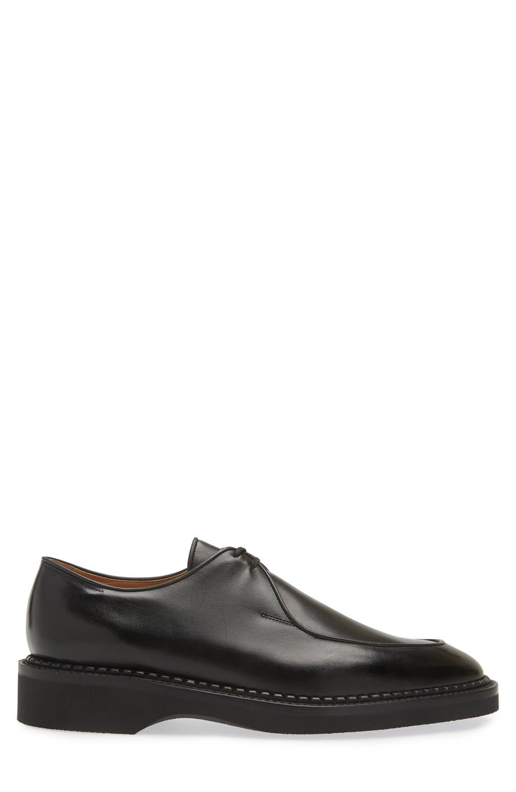 Clean lines bring streamlined minimalism to a sleek chukka loafer fashioned from smooth leather with a ridged welt and crepe sole. Lace-up style Leather upper and lining/rubber sole Imported Designer Shoes Modern Low-top Leather Shoes For The Office, Modern Plain Toe Oxfords For Business, Sleek Office Dress Shoes With Rubber Sole, Modern Loafers With Rubber Sole, Modern Oxfords With Stitched Sole For Workwear, Modern Slip-on Oxfords For Business, Modern Leather Shoes With Rubber Sole For Office, Sleek Oxfords With Rubber Sole And Plain Toe, Modern Plain Toe Loafers With Rubber Sole