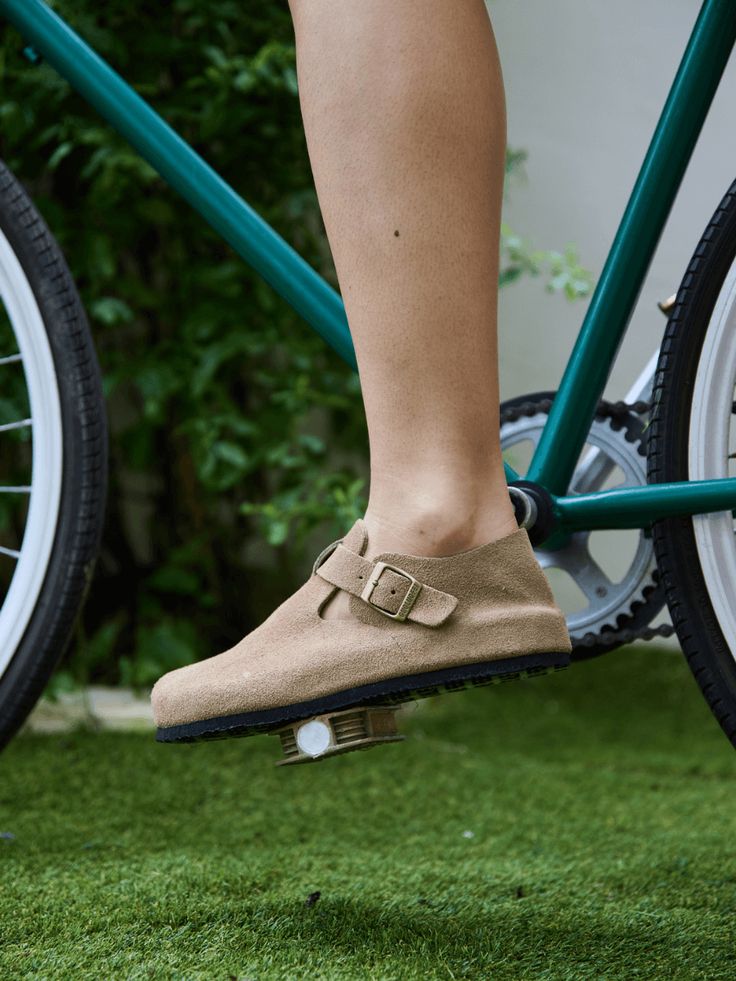 Experience unbeatable comfort with the MAIBULUN Seashore Suede Clog Loafer. Made with soft suede material, these loafers are perfect for all-day wear, providing both style and support. Slip into these tan loafers and take on your day with ease. 0.78" Heel Slip-on / buckle closure Hard Cushioned footbed Suede 100% leather upper Leather lining EVA sole Everyday Clogs With Textured Footbed And Round Toe, Cushioned Round Toe Loafers For Walking, Everyday Flat Heel Clogs With Rubber Sole, Casual Suede Clogs With Round Toe, Flat Heel Loafers For Walking, Loafers With Removable Insole For Walking, Walking Loafers With Removable Insole And Round Toe, Suede Flats With Leather Footbed, Everyday Suede Clogs With Rubber Sole