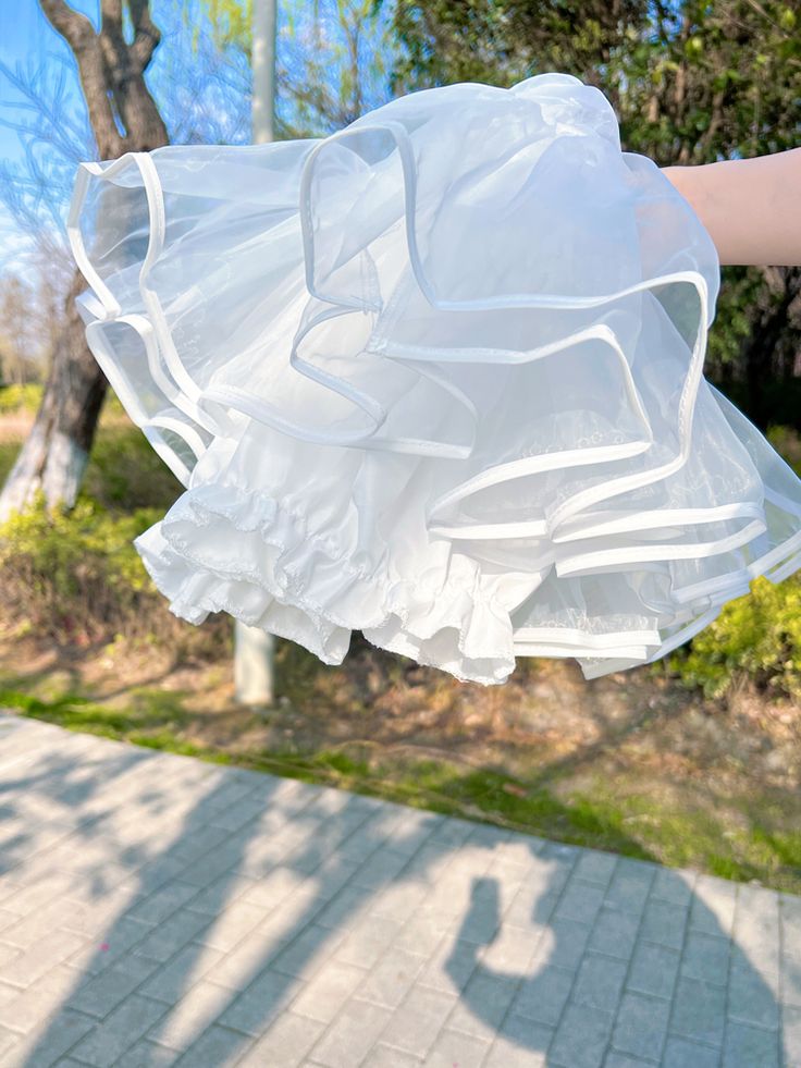 Add Volume and Flare to Your Lolita Look with our White/Black 30cm Bloomers Lining Petticoat! Perfect for completing your Lolita outfit, this petticoat provides the ideal amount of fluff and fullness to your skirt, ensuring a beautiful silhouette with every step. Made with high-quality materials, it offers both comfort and style, making it a must-have for any Lolita fashion enthusiast. Elevate your wardrobe with this versatile and essential petticoat today!   	 		 			Size 			Free Size 		 		 			F Summer Crinoline Petticoat For Costume Party, Summer Costume Party Crinoline Petticoat, Ruffled Bottoms For Summer Costume Party, Spring Costume Party Skirt With Ruffles, Spring Can-can Petticoat In Crinoline, Summer Costume Party Skirt With Attached Cancan, Summer Crinoline Petticoat With Ruffles, Spring Party Can-can Petticoat, Spring Costume Party Ruffled Petticoat