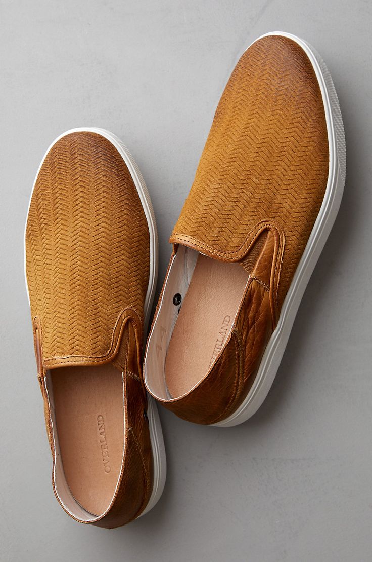 Slip into summer with ease—the Vince leather shoes will take care of the rest. Laid back and comfortable, these slip-ons offer equal parts practicality, durability, and playfulness. Made from Italian leather with a herringbone-print nubuck vamp, these sporty-casual shoes feature cushioned inner soles, pigskin leather lining, and rubber soles. Brown Swift Leather Casual Slip-ons, Leather Slip-ons With Woven Sole For Summer, Comfortable Brown Slip-on Sneakers For Spring, Casual Swift Leather Slip-ons With Round Toe, Casual Leather Slip-ons With Textured Sole, Summer Slip-on Low-top Loafers, Leather Slip-ons With Woven Sole For Spring, Brown Rubber Sole Sneakers For Summer, Brown Leather Summer Sneakers