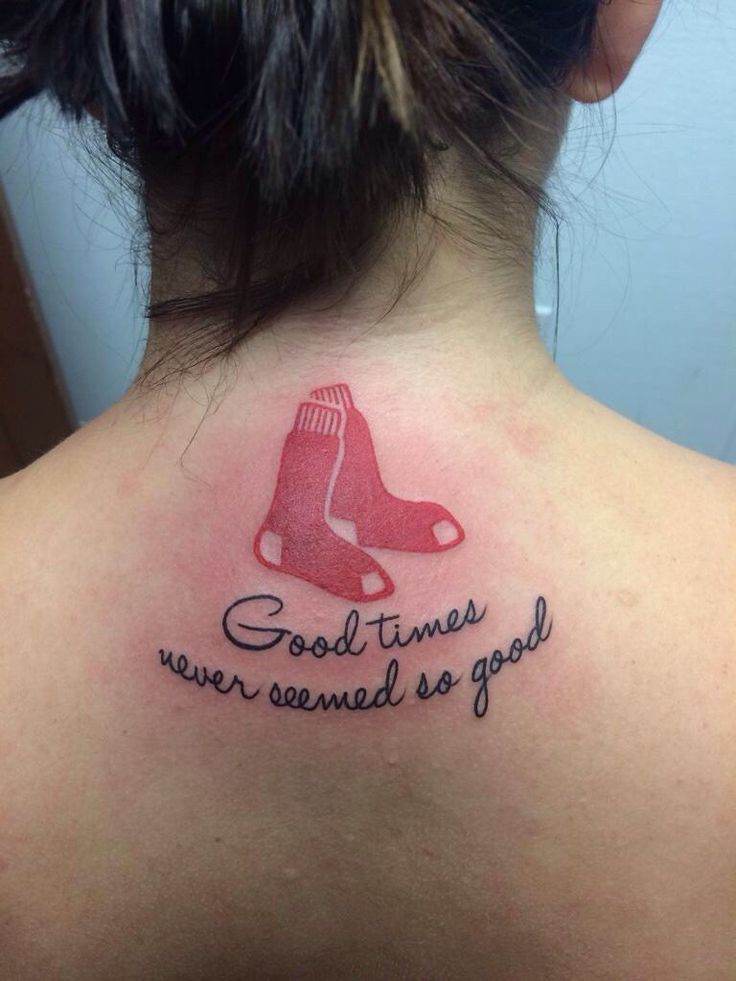 the back of a woman's neck with a tattoo saying good times were called so good