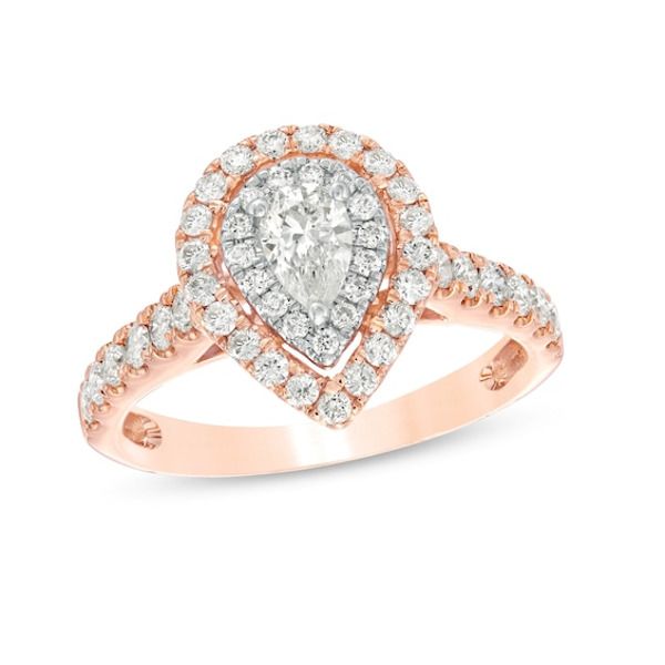 Honor her with the sparkle of this fancy-cut diamond engagement ring. Crafted in 14K rosegold, this timeless look shimmers with a 1/4 ct. pear-cut diamond wrapped in two teardrop-shaped halo frames. The shank also dazzles with diamonds. Tantalizing with 1 ct. t.w. of diamonds and a brilliant buffed luster, this engagement ring is just her style. Pear-shaped Rose Gold Diamond Ring With Halo Setting, Pear Shaped Wedding Rings, Pear Shaped Diamond Engagement Rings, Double Frame, Engagement Ring Shapes, Engagement Ring Diamond Cut, Pear Cut Diamond, Buying Diamonds, Pear Shaped Diamond