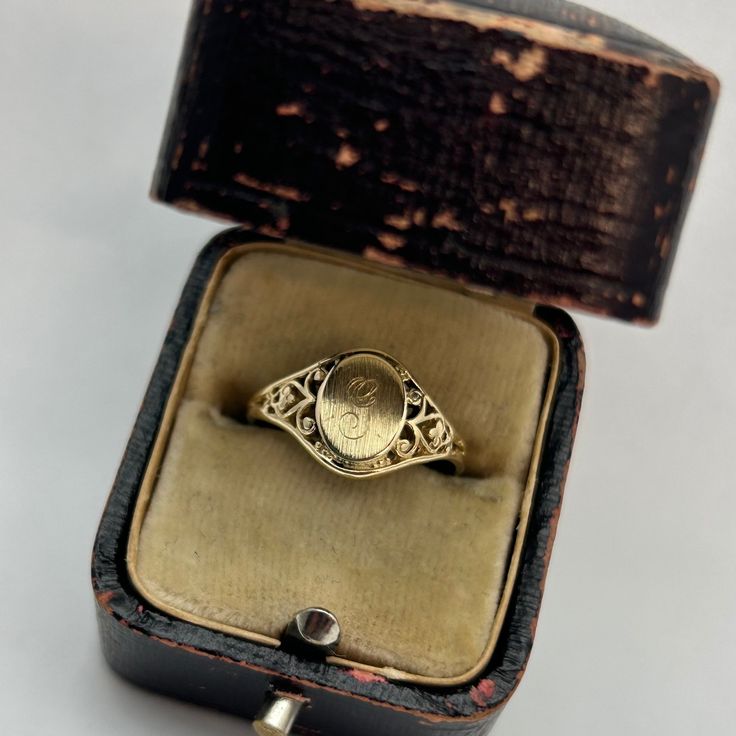 Display ring box is not included in purchase ALL SALES FINAL, NO RETURNS **some scratches present** Metal: 10k gold Weight:  1.6 grams (1.1 DWT) Dimensions: height 19mm, width 18mm, depth 10mm Note: stamped 10k  Size: 6 Can be sized by a reputable jeweler. We are new to Etsy, but our home store in Evansville, IN has been in business since 1898. We are a 5th generation family-owned business and have certificates in diamond grading from the GIA (Gemological Institute of America). All items listed Initial G, Home Store, Engraved Rings, Visa Mastercard, Ring Box, Antique Items, Signet Ring, 10k Gold, Our Home