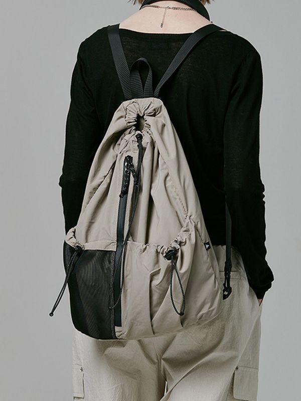 This is a casual and comfortable sling bag that is made out of high quality polyester and nylon 100% fabric. With design detail of logo print on the back and detachable shoulder strap, it gives a trendy and casual mood.- 2-way styling as a backpack or sling bag- Front water resistant zipper- 3M elastic string and 3M logo print String Backpack, Running Backpack, Teach Wear, One Strap Backpack, Techwear Fashion, Pet Bag, String Bag, Cross Bag, Hiking Outfit