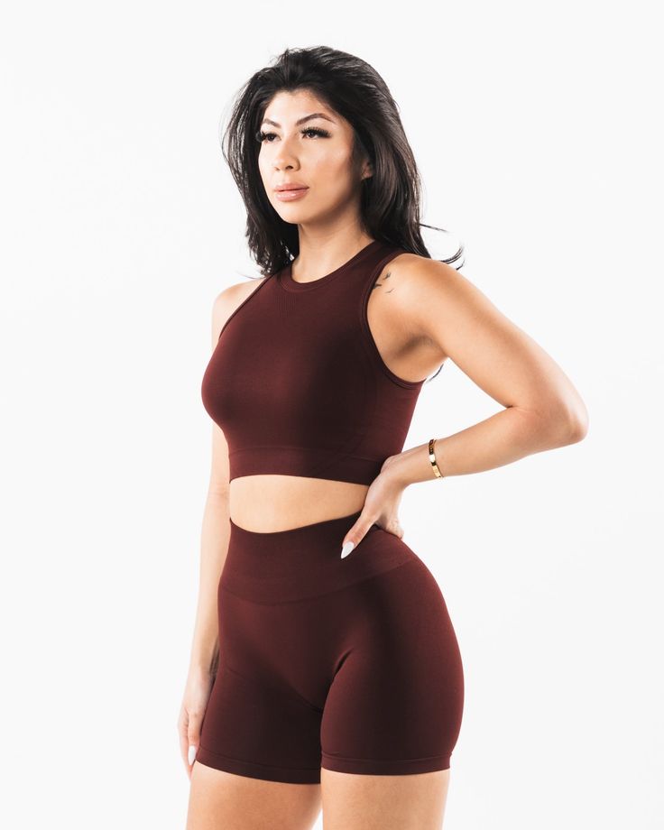 HIGHLIGHTS Crew neckline.. Low impact. Long line length tank. Wide back style. Reinforced binding arm finishing. Alphalete Core logo printed on center lower back FIT SUGGESTION. This item runs true to Alphalete’s standard seamless fit.. If you are between sizes, we recommend sizing up.. Model is 5’3”/160cm, wearing a size S with a 33”/84cm bust. MATERIALS AND WASHING DIRECTIONS. 51% Polyamide, 38% Polyester, 11% Elastane. We recommend washing inside-out on a cold setting. Hang to dry DESCRIPTION High Stretch Seamless Sports Tank Top, Athleisure Seamless Fabric Tank Top For Sports, Stretch Seamless Fabric Sports Tank Top, Athleisure Seamless Tank Top For Sports, Sporty Seamless Fabric Tank Top For Training, Stretch Seamless Sleeveless Sports Bra, Sporty Seamless Tank Top For Training, Moisture-wicking Seamless Sleeveless Sports Bra, Stretch Sleeveless Sports Bra In Seamless Fabric