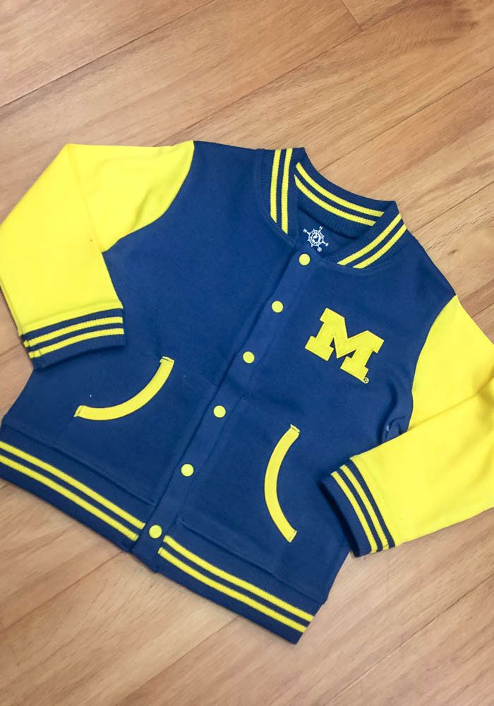 Michigan Wolverines Toddler Navy Blue Varsity Outerwear Light Weight Jacket Team-colored Outerwear With Team Name For Game Day, Collegiate Outerwear With Team Name For Game Day, Long Sleeve Outerwear With Ribbed Cuffs For Game Day, Team-colored Outerwear For Game Day With Team Spirit, Team-colored Outerwear For Game Day, Long Sleeve Varsity Jacket For Sports Fans, Blue Sporty Outerwear For Game Day, Team-colored Outerwear For Game Day In Fall, Team-colored Outerwear For Game Day And Sports Season