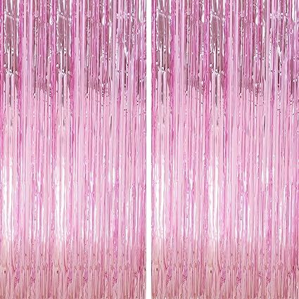 pink tinsel curtains hanging from the ceiling