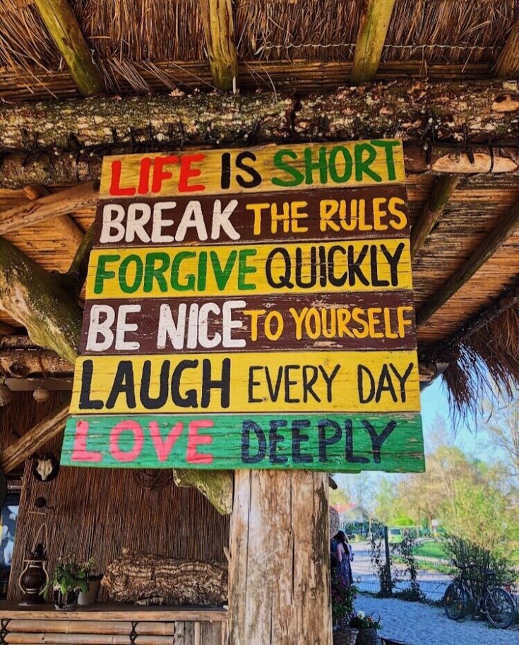 a sign that says life is short break the rules for give quickly be nice to yourself laugh love deeply