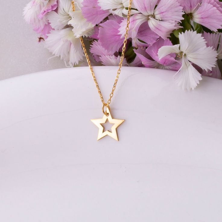 PLEASE READ DESCRIPTION & POLICIES Star Pendant Necklace / Cute Star Necklace / Dainty Star Necklace / Small Star Necklace / Delicate Star Necklace / Gold Star Necklace  DESCRITION  Shine bright with this dainty star pendant necklace, crafted from nickel-free 925 Sterling Silver. Available in gold-plated, rose gold-plated, and sterling silver finishes, each piece features a premium 1-micron layer of real 18ct gold for a highly polished look. This cute and delicate star necklace, available in lengths from 14" to 20", includes a 1mm rope chain secured with a spring ring closure. Perfect for adding a touch of sparkle to any outfit, this small star necklace makes an elegant and charming gift for her.   DETAILS  ✦ Material: 925 Sterling Silver (nickel free)(stamped) ✦ Finish: Gold, Rose Gold, S Minimalist Star Charm Necklaces For Gift, Minimalist Star Charm Necklace Gift, Gold Jewelry With Star Print For Gift, Gold Necklaces With Star Charm For Birthday, Star-shaped Charm Necklace For Gift, Star Charm Necklace As Gift, Star Charm Necklace For Gift, Star Charm Necklace Gift, Gold Star Charm Jewelry For Birthday