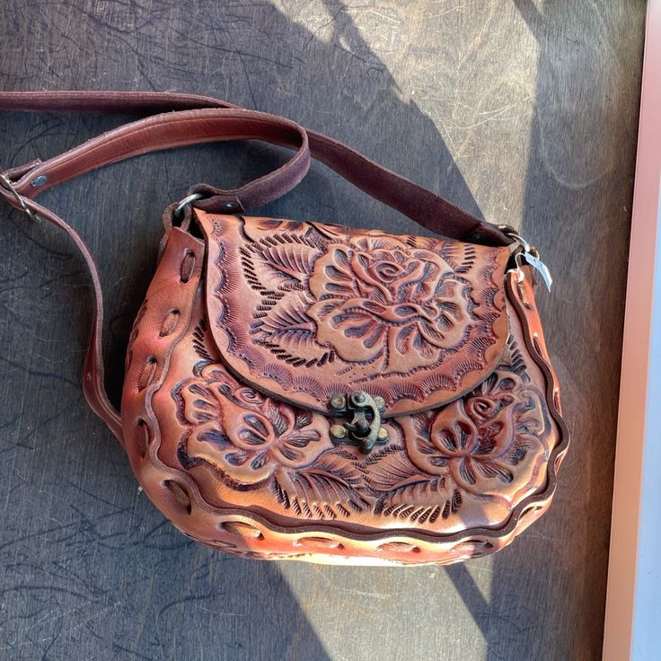 This Beautiful Made By Hand Authentic Leather Bag Was Bought In Mexico. I Do Not Have The Receipt. It Has The Tag On It, And The Stamp. That Is All The Authenticity Proof I Have. Bohemian Hand Tooled Saddle Bag, Artisan Bag With Adjustable Strap, Hand Tooled Leather Crossbody Shoulder Bag, Daily Use Hand Tooled Satchel, Hand-tooled Rectangular Saddle Bag, Bohemian Leather Satchel With Detachable Strap, Hand Tooled Leather Crossbody Saddle Bag, Artisan Crossbody Saddle Bag, Hand Tooled Leather Pouch Satchel