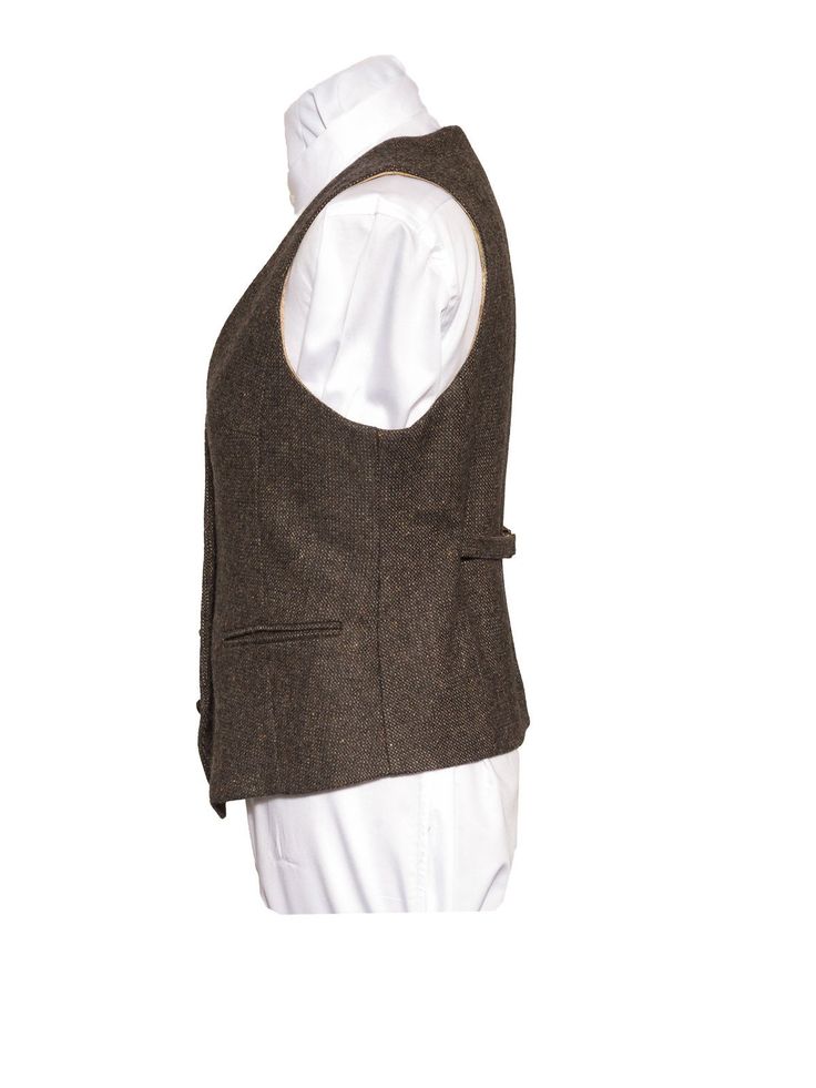 This is our Ladies Brown Tweed Waistcoat. It has been carefully designed to exude charm and grandeur. The smart waistcoat exceeds any level of wealth for any occasions. The Irish heritage and storytelling behind this waistcoat is forever timeless to the wearer. The made in Ireland quality standard is unbeatable. The fabric we have used to create this garment is both breathable and durable. The Celtic Tweed ladies collection of tweed waistcoats/vests are our interpretation on timeless Irish desig Tweed Vest With Pockets For Tailoring, Tailored Single-breasted Tweed Vest, Single Breasted Tweed Vest For Workwear, Fall Tweed Single Breasted Vest, Fall Tweed Single-breasted Vest, Winter Business Tweed Vest, Tailored Classic Tweed Vest, Tailored Brown Tweed Vest, Tweed Business Vest For Fall