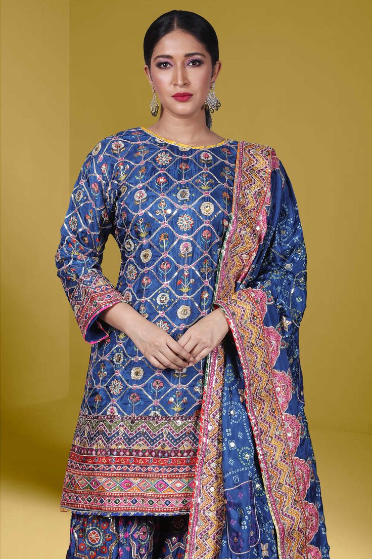 Step out in style with our Partywear Suit D-166! This stunning suit features a beautiful floral print that is sure to turn heads. The added touch of sequins adds a touch of sparkle and elegance. Elevate your wardrobe and make a statement with this must-have piece. Fitted Silk Sharara With Multicolor Embroidery, Silk Fitted Sharara With Multicolor Embroidery, Festive Multicolor Embroidered Sequined Sets, Festive Sets With Multicolor Embroidery And Sequins, Festive Multicolor Embroidery Sequined Sets, Party Semi-stitched Floral Print Palazzo Set, Fitted Multicolor Palazzo Set With Zari Work, Party Semi-stitched Floral Palazzo Set, Fitted Embroidered Palazzo Set With Dupatta