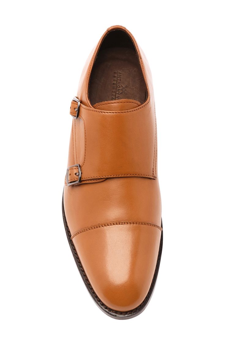 A cap-toe and double-monk strap add vintage-inspired appeal to this leather shoe balanced on a Goodyear welted sole. Leather upper, lining and sole Imported Asian Owned/Founded Business Casual Slip-on Monk Strap Shoes With Leather Lining, Timeless Slip-on Monk Strap Shoes With Leather Lining, Timeless Leather-lined Monk Strap Slip-on Shoes, Timeless Leather-lined Slip-on Monk Strap Shoes, Masculine Brown Plain Toe Monk Strap Shoes, Masculine Brown Monk Strap Shoes With Plain Toe, Brown Monk Strap Shoes For Business Casual, Business Casual Monk Strap Shoes With Calf Leather, Masculine Monk Strap Shoes For Business Casual