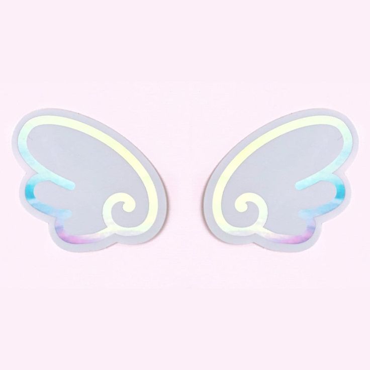 two white angel wings with blue and pink highlights on the back of them, against a light pink background