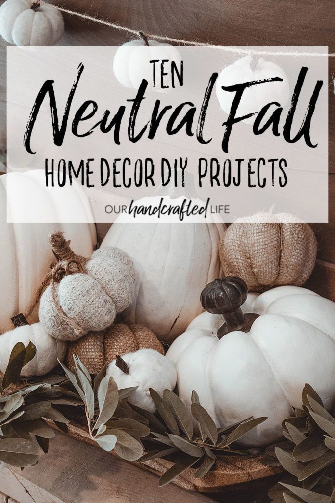 a basket full of white pumpkins and greenery with text overlay that reads ten neutral fall home decor projects