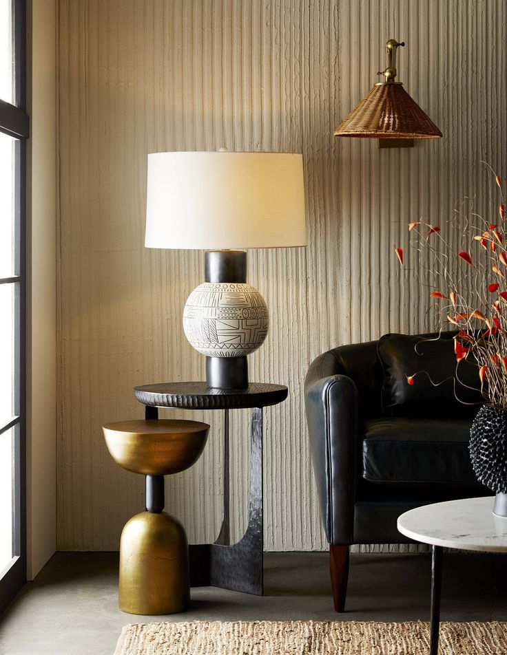 a living room filled with furniture and a lamp