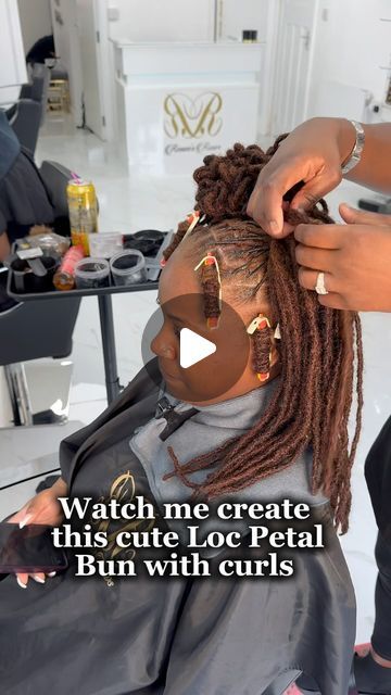 Renee |Hairstylists|Ukhair🇬🇧🇯🇲 on Instagram: "A Mini Loc petal bun tutorial on my beautiful client 🥰  What do you think about the end result??   I hope you guys found it useful coz this voiceover gave me a headache 🤕   I will get better as I go along I promise 😂  Big up my wonderful assistant starring in the background ☺️  Book your consultation today!  💎 A luxury service awaits you 🔗 in bio 👆🏾let’s talk!  #locstutorial #locstyling #tutorial #womenwithlocs #womenlocstyles #blackwomenwithlocs #naturaldreads #girlstyles #petalbuns #locpetals #twistlocs #explorepage #curlylocs #locgician" Locs With Petals, Petal Bun Soft Locs, Petal Loc Styles For Women, How To Do Loc Petals, Dreadlock Petals Loc Hairstyles, Locs With Wooden Beads, Classy Loc Hairstyles, Loc Styles For Party, Loc Space Bun Styles