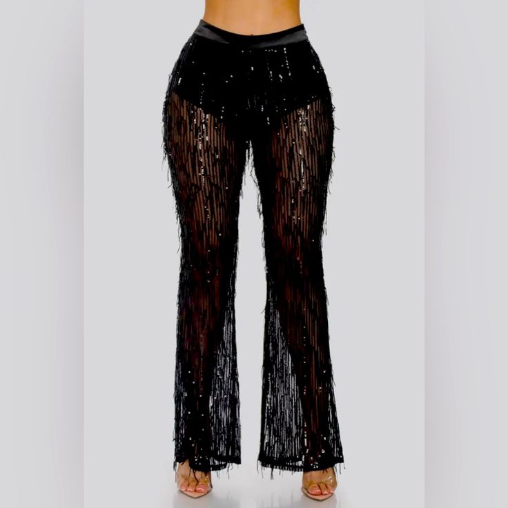 Featuring A High Waisted Underwear Lining Sheer Layered Sequin Wide Leg Pants And Side Zipper. Self: 95% Polyester 5% Spandex Contrast: 90% Polyester 10% Spandex Lining: 100% Polyester Made In China Black Elastane Bottoms For Club, Elastane Party Leggings, Stretch Sequin Bottoms For Club, Chic Party Leggings In Elastane, Chic Stretch Bottoms For Party, Chic Elastane Leggings For Party, Glamorous High Rise Bottoms For Night Out, Stretch Leather Pants For Party, High Rise Bottoms For Club In Spring