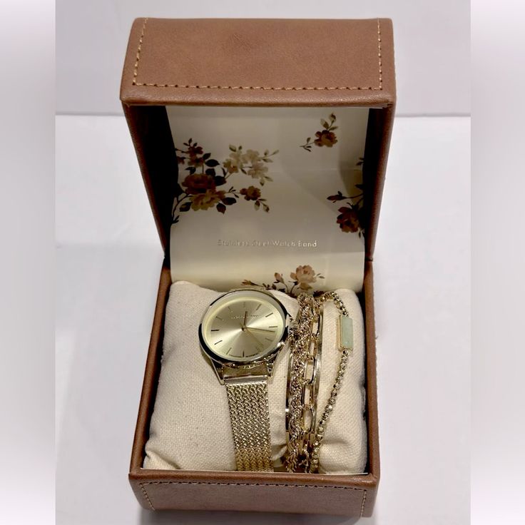 Lucky Brand Women's Watch Features A High-Quality Solid Quartz Movement, Which Ensures That The Watch Keeps Accurate Time And Is Easier To Read. The Branded Mesh Straps Are Comfortable And Lightweight, Allowing Your Wrists To Move Freely. The Mineral Glass Lens Prevents Scratches And Keeps The Watch Looking Like New. Add Style To Your Life With This Gold Stainless Steel Watch As A Gift, Gold Stainless Steel Watch For Gift, Gold Jewelry And Watches With Metal Dial As Gifts, Elegant Adjustable Watch Accessories For Gift, Timeless Jubilee Bracelet Watch Accessory As Gift, Timeless Jubilee Bracelet For Watches As A Gift, Metal Watch Accessories With Round Dial For Gift, Elegant Watch Accessories With Bracelet Strap For Gift, Gift Watches With Jubilee Bracelet