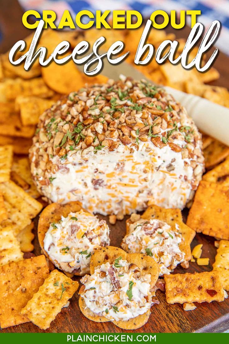 cracked out cheese ball on a platter with crackers