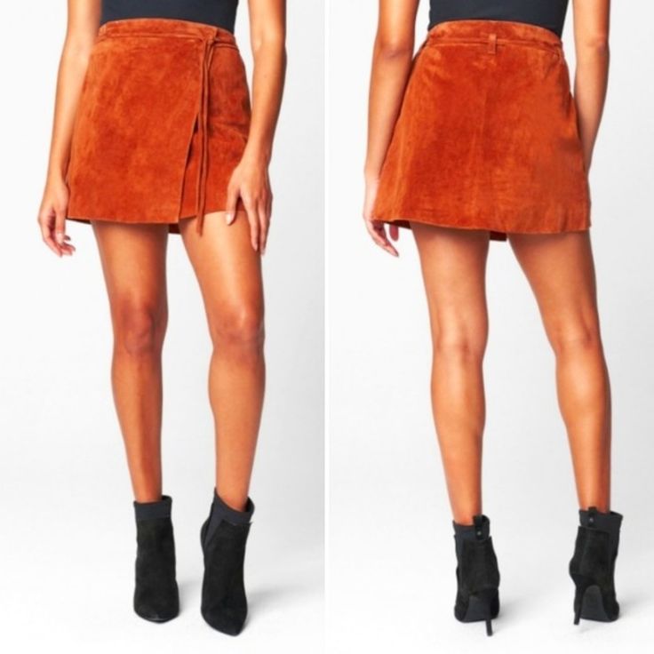 Brand New With Tags Blank Nyc Luxuriously Chic Genuine Leather Suede Wrap Mini Skirt In A Versatile Style That Goes With Everything,Wear It With Knee Or Ankle Boots Or Even Sneakers Size 26 (Fits Size 4\Small) Color Hot Toffee (Pumpkin Orange\Tan) 100% Genuine Leather Suede Wrap Mini Skirt Leather Tie Belt Belt Loops & Snap Closure Lining: 97% Polyester, 3% Spandex Dry Clean By Leather Specialist Leather Mini Bottoms For Fall, Fitted Brown Mini Skirt With Belt Loops, Trendy Short Fall Skirt, Fall Mini Skirt Bottoms With Belt Loops, Fall Denim Skirt With Belt Loops, Brown Skirt For Fall, Chic Short Mini Skirt For Fall, Brown Mini Skirt With Belt Loops, Fitted Leather Shorts For Fall