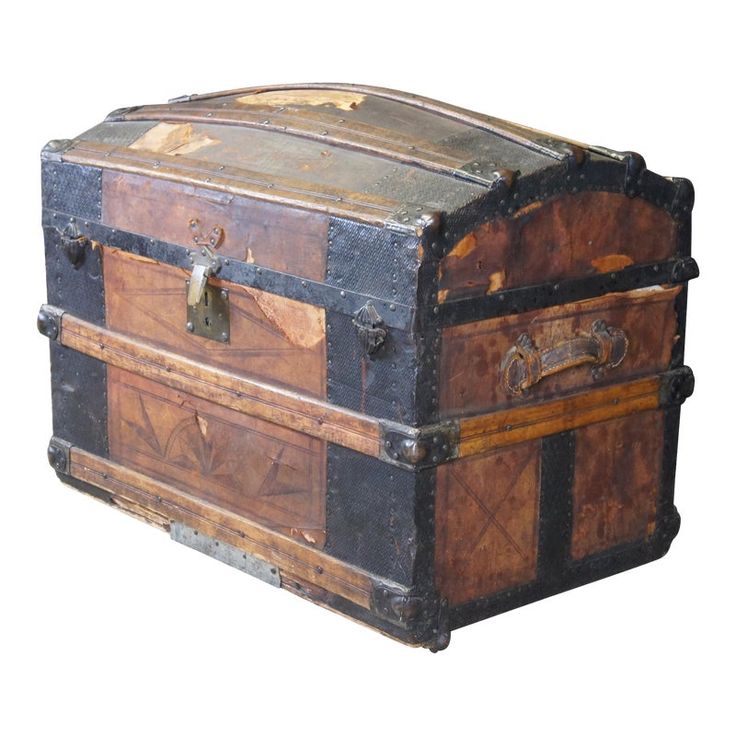 an old wooden chest with metal handles and latches on the top, sitting against a white background