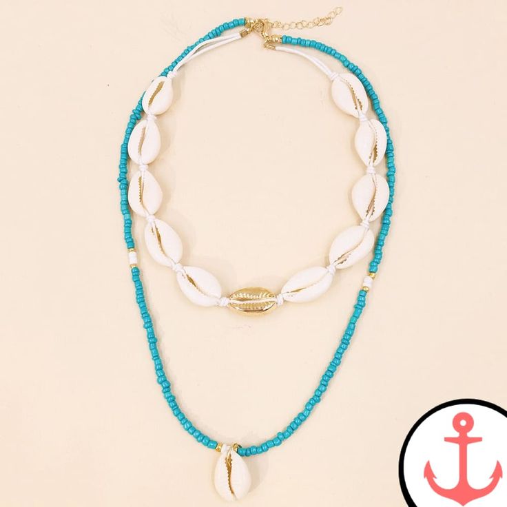 Introducing the Shell Beaded Necklace: A Treasure of the Sea Take a journey into the enchanting world of the ocean with our exquisite Shell Beaded Necklace. Designed for passionate sea lovers like you, this mesmerizing piece of nautical jewellery captures the essence of the sea's natural beauty. Whether you're strolling along the beach or attending a special occasion, this necklace will effortlessly elevate your style to new depths. As part of our Shell necklace collection, the Shell Beaded Neck Ocean-inspired Beaded Jewelry, Bohemian Blue Strand Jewelry, Blue Bohemian Strand Jewelry, Turquoise Jewelry With Colorful Beads For Beach Season, Blue Strand Necklaces For Beach Season, Ocean-inspired Turquoise Beaded Necklaces For Gifts, Ocean-inspired Turquoise Beaded Necklaces As Gift, Turquoise Beaded Jewelry For Vacation, Ocean-inspired Round Gemstone Bead Jewelry