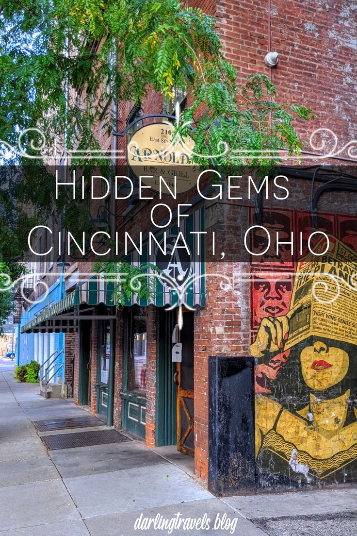 the side of a building with graffiti on it that says hidden gems of cincinnati, ohio