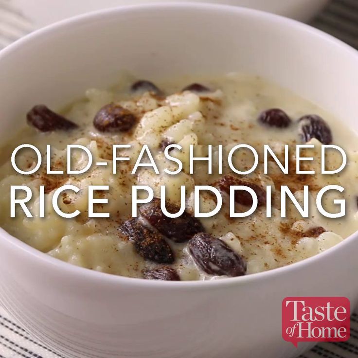 an old fashioned rice pudding recipe in a white bowl with raisins on top