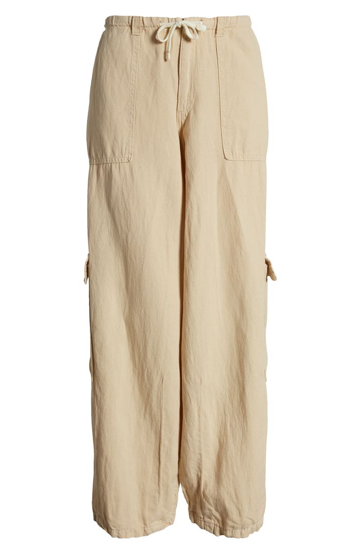 Elevate your casual wardrobe with these drawstring-waist cargo pants crafted from fresh, lightweight cotton in a baggy silhouette. 31 1/2" inseam; 17" leg opening; 10 1/2" front rise; 15 1/2" back rise (size Medium) Exclusive retailer Zip fly; drawstring waist Front slant pockets; cargo flap-patch pockets 100% cotton Machine wash, line dry Made in Turkey Beige Cargo Pants With Pockets For Spring, Beige Cargo Jeans With Cargo Pockets For Spring, Cream Utility Cargo Pants With Pockets, Cream Utility Cargo Pants, Utility Cream Cargo Pants, Cream Utility Cargo Pants For Spring, Cream Cotton Cargo Pants, Cream Cotton Cargo Pants With Pockets, Cream Cotton Utility Bottoms