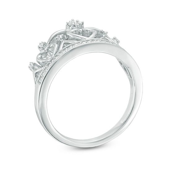 Certain to delight, this regal diamond crown ring is a loving tribute to the queen of your heart. Crafted in sterling silver, this detailed design features open hearts and sparkling diamonds. At its base, the style showcases a "headband" of shimmering diamonds. Captivating with 1/6 ct. t.w. of diamonds and a bright polished shine, this ring proclaims her sophisticated look. Custom-made to fit her ring size. Sterling silver rings cannot be resized after purchase. Crown Shaped Diamond Ring For Anniversary, Anniversary Crown-shaped Diamond Ring With Accents, Anniversary Crown Diamond Ring In White Gold, Crown-shaped Diamond Ring With Diamond Accents, Crown-shaped Diamond Ring With Accents, Crown Shaped Diamond Ring With Diamond Accents, Crown Shaped Diamond Ring Fine Jewelry, Crown Shape Diamond Ring With Accents, Fine Jewelry Crown-shaped Diamond Ring With Accents