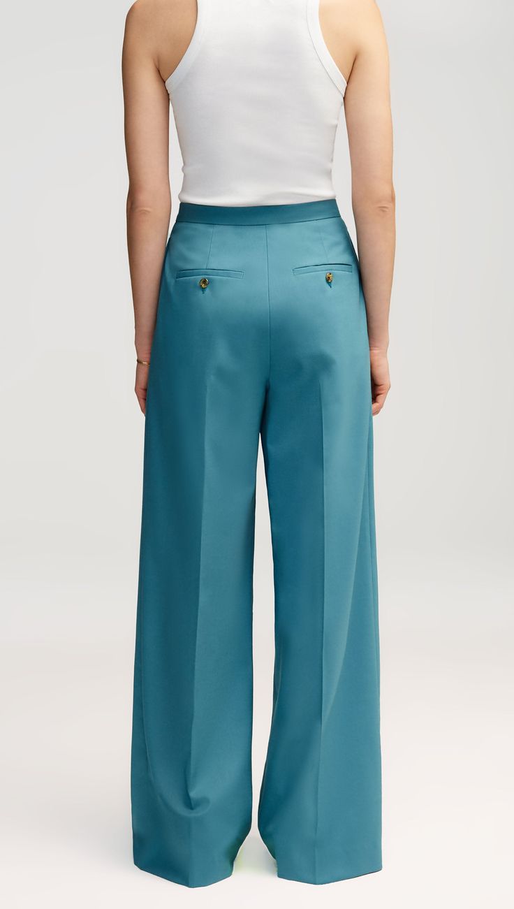 Our Jones Trouser is a quintessential piece that strikes a flawless balance between form and function. Made of Seasonless Wool, this pant features two back pockets in addition to a hidden credit card pocket in the front. Pair with a camisole, cardigan, and sandals for a classic outfit that will take you from season to season. Denim Vests, Cadet Blue, Classic Outfit, Lapel Blazer, Women's Blazers, Good To See You, Womens Blazers, New Career, Midnight Black