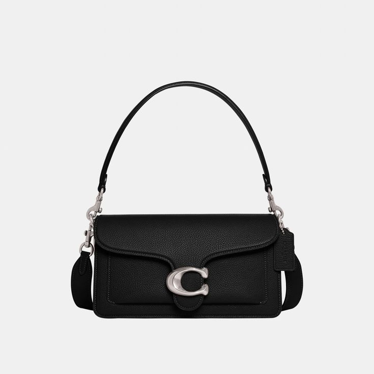 A modern take on an archival 1970s Coach design our structured Tabby shoulder bag is crafted of polished pebble leather. Finished with our Signature hardware for an iconic touch the compact 26 features two detachable straps to carry by hand style as a short shoulder bag or wear crossbody. | Coach Tabby Shoulder Bag 26 - Women's - Silver/black Classic Flap Bag With Silver-tone Hardware For Everyday Use, Classic Flap Shoulder Bag With Palladium Hardware, Classic Everyday Flap Bag With Silver-tone Hardware, Classic Satchel With Silver-tone Hardware And Flap, Classic Flap Bag With Metal Hardware, Classic Saddle Bag With Silver-tone Hardware For Everyday, Classic Flap Bag With Silver-tone Hardware And Top Handle, Classic Rectangular Saddle Bag For Evening, Evening Flap Bag With Palladium Hardware