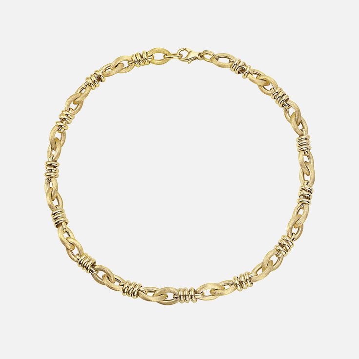 The Lionheart Jewelry Arianna Knot Chain is hand crafted in 14k Yellow Gold and features a unique design of interlocking links. This is the perfect piece to start your ever so enviable neck stack! 14k Yellow Gold Made In Italy Yellow Gold Chain Link Necklace In Fine Jewelry Style, Yellow Gold Chain Link Necklace Fine Jewelry, Oval Link Chain Necklace For Anniversary, Anniversary Jewelry With Cable Chain And Rectangular Links, Anniversary Jewelry With Rectangular Link Cable Chain, Heirloom 14k Gold Oval Link Jewelry, Gold-tone Chain Link Jewelry With Hooks, Fine Jewelry Yellow Gold Chain Link Necklace, Yellow Gold Chain Link Necklace For Anniversary