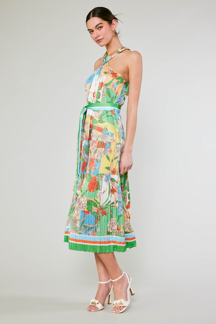 Featuring colorblock overlaid with a hand-drawn floral print, this midi dress delivers the punch your wardrobe needs this season. It's got a gathered halter neckline with a touch of smocking, plus a shin-skimming hem flaunting micropleats. • halter neckline •Back keyhole with covered buttons •Pleated skirt •Mid-length hem •Original 'Botanical Color Block' print, designed by Current Air DIMENSIONS •Standard: 50.5" Length Item number 2490181 100% Polyester Gentle Cycle The Punch, Drawn Floral, Wardrobe Needs, Block Dress, Print Trends, Stripe Dress, Border Print, Sweater Sale, Floral Stripe